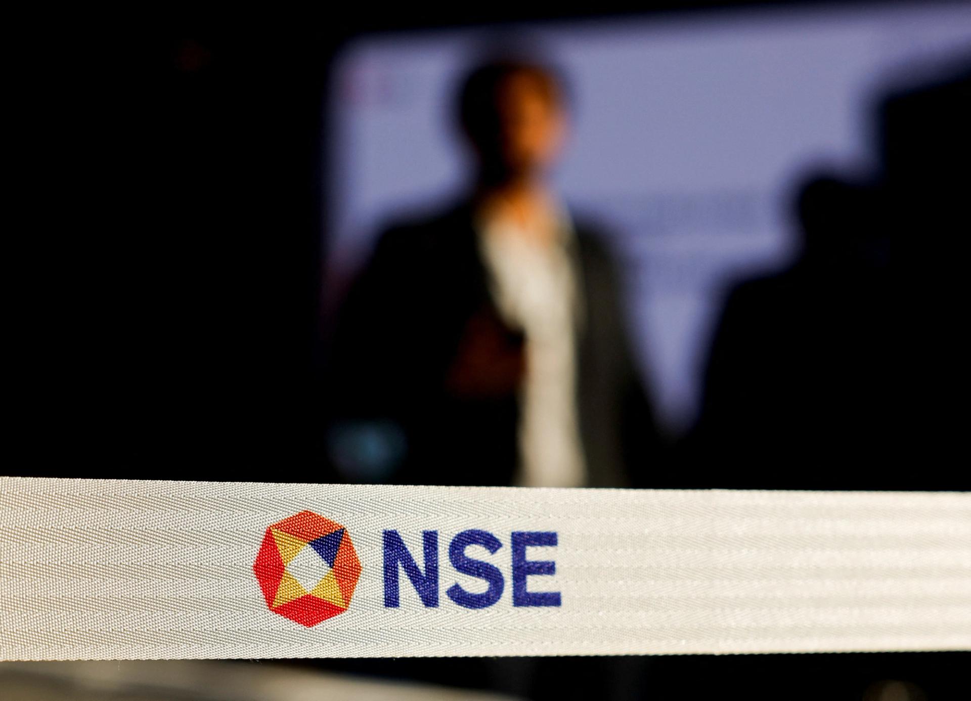 A man walks inside the National Stock Exchange in Mumbai.