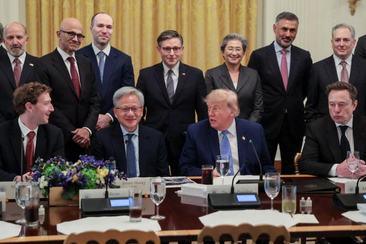 Tech leaders at an event with US President Donald Trump.