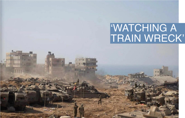 Israeli soldiers and tanks take position inside the Gaza Strip, according to the Israeli Defense Forces (IDF), in this handout picture obtained by Reuters on November 5, 2023. IDF/Handout via REUTERS