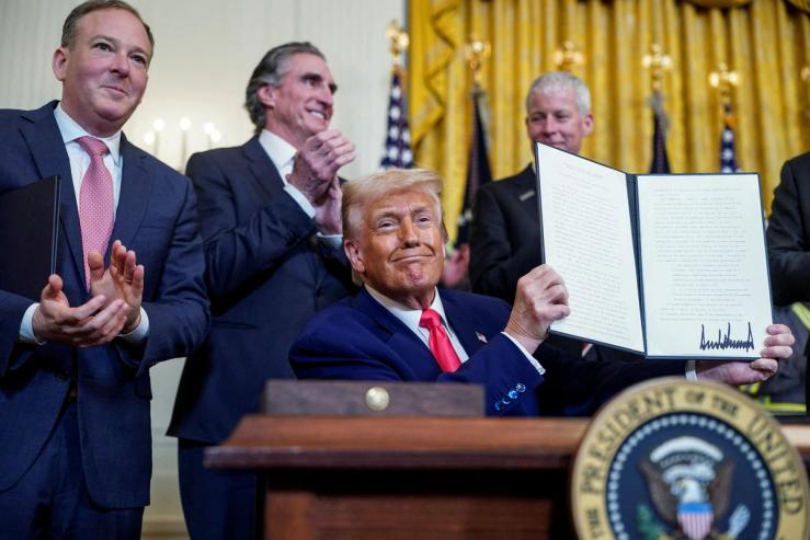 Donald Trump as he holds an energy-related executive order.