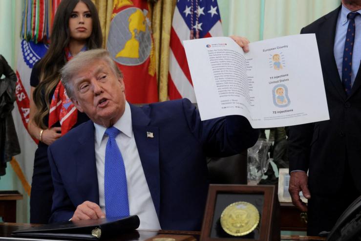 US President Donald Trump speaks during an event to sign an executive order regarding vaccines.