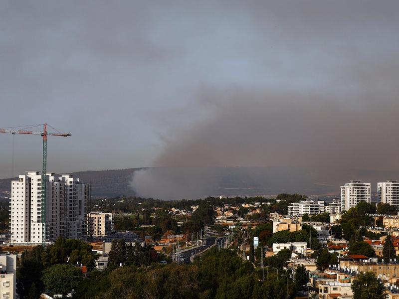 Smoke rises above Israel's border with Lebanon, as seen from Nahariya in northern Israel, October 22, 2023. REUTERS/Lisi Niesner