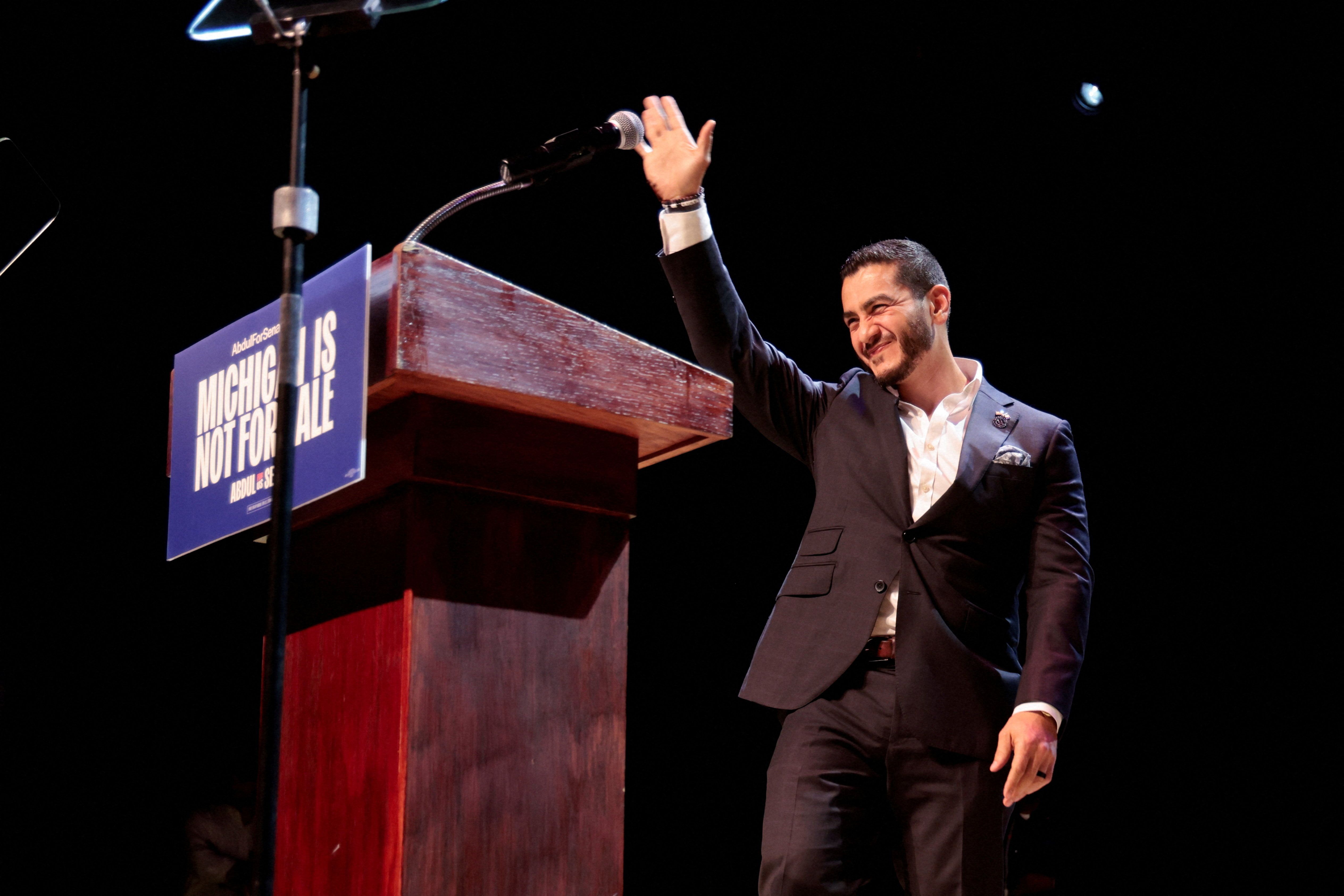 U.S. Senate Democratic candidate Abdul El-Sayed waves on stage, with vote counting continuing for Michigan’s Democratic U.S. Senate primary, during an election night rally in Detroit, Michigan.