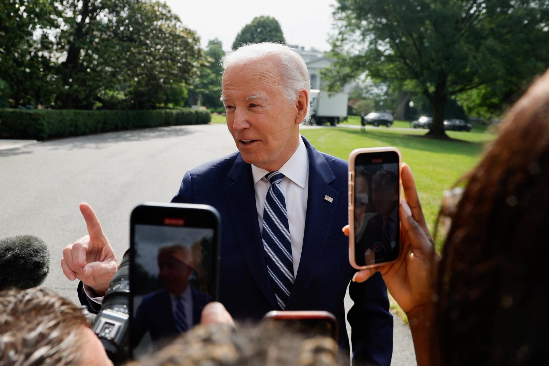U.S. President Joe Biden speaks to members of the media as he departs for travel to Chicago from the White House in Washington, U.S. June 28, 2023.