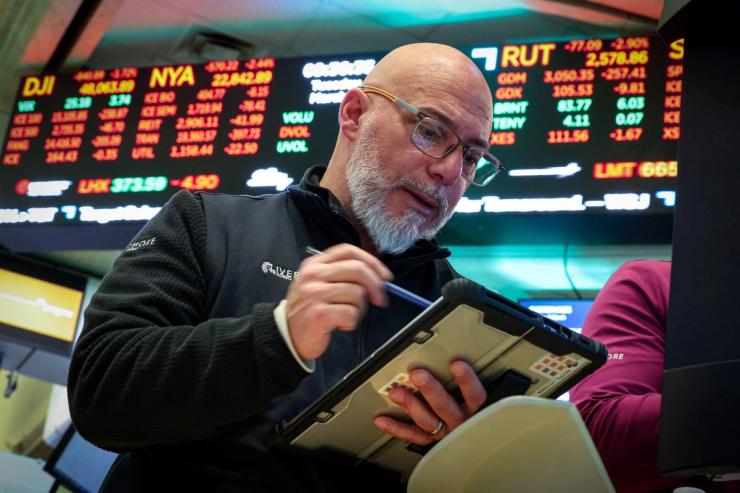 Trader on the floor of the New York Stock Exchange