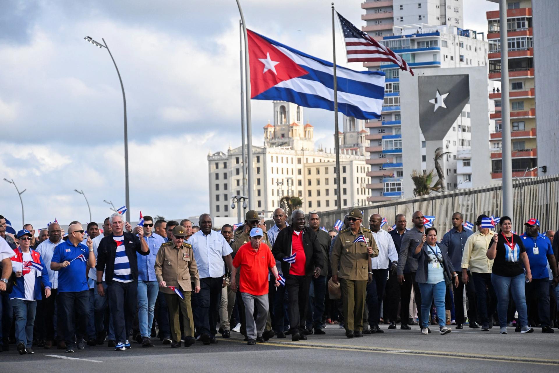 Cuba’s former President Raul Castro and Cuba’s President Miguel Diaz-Canel walk past the US Embassy during a protest against the trade embargo on Cuba by the US in December.