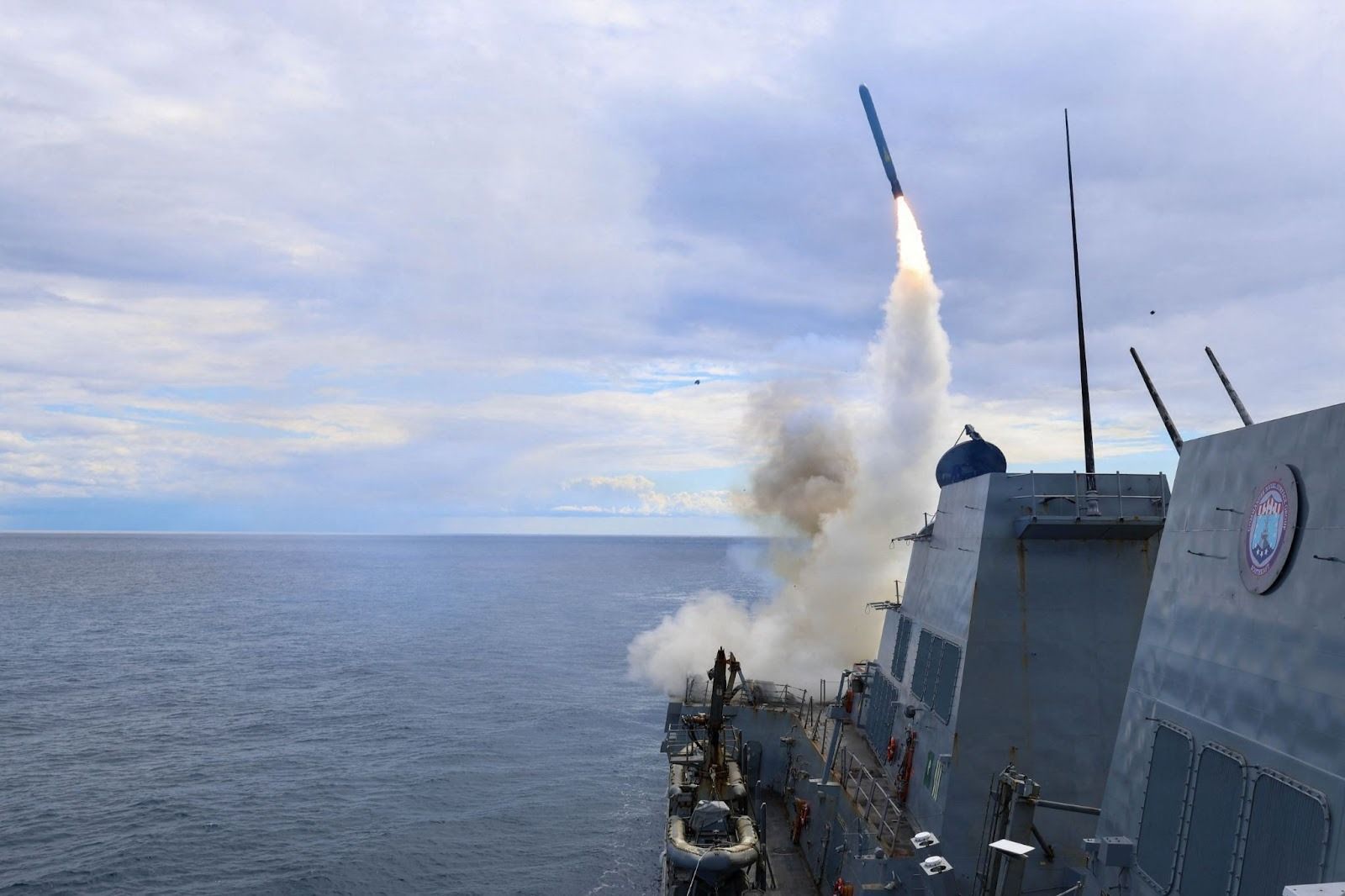 A US ship firing a Tomahawk missile. 