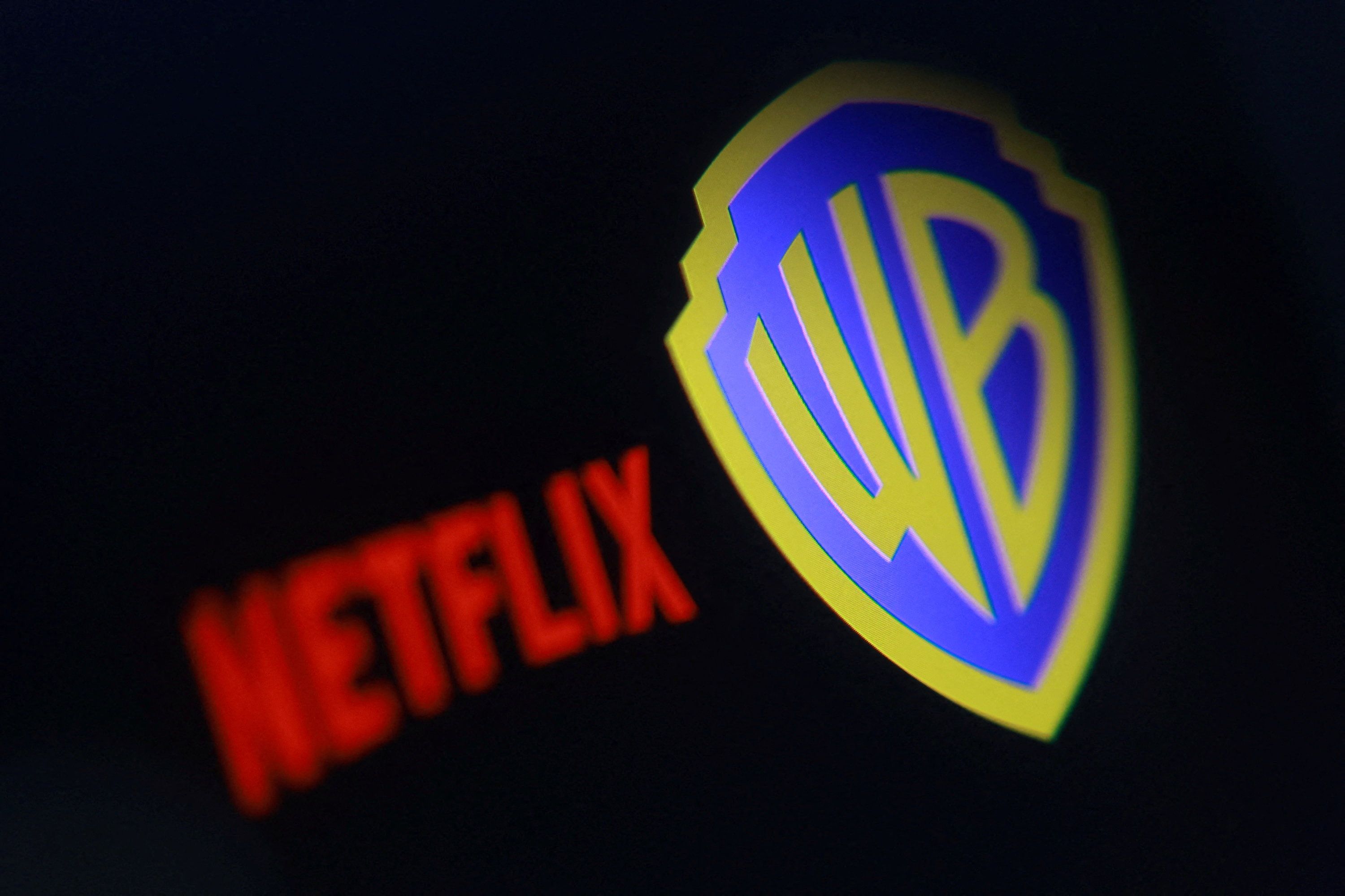The WBD and Netflix logos
