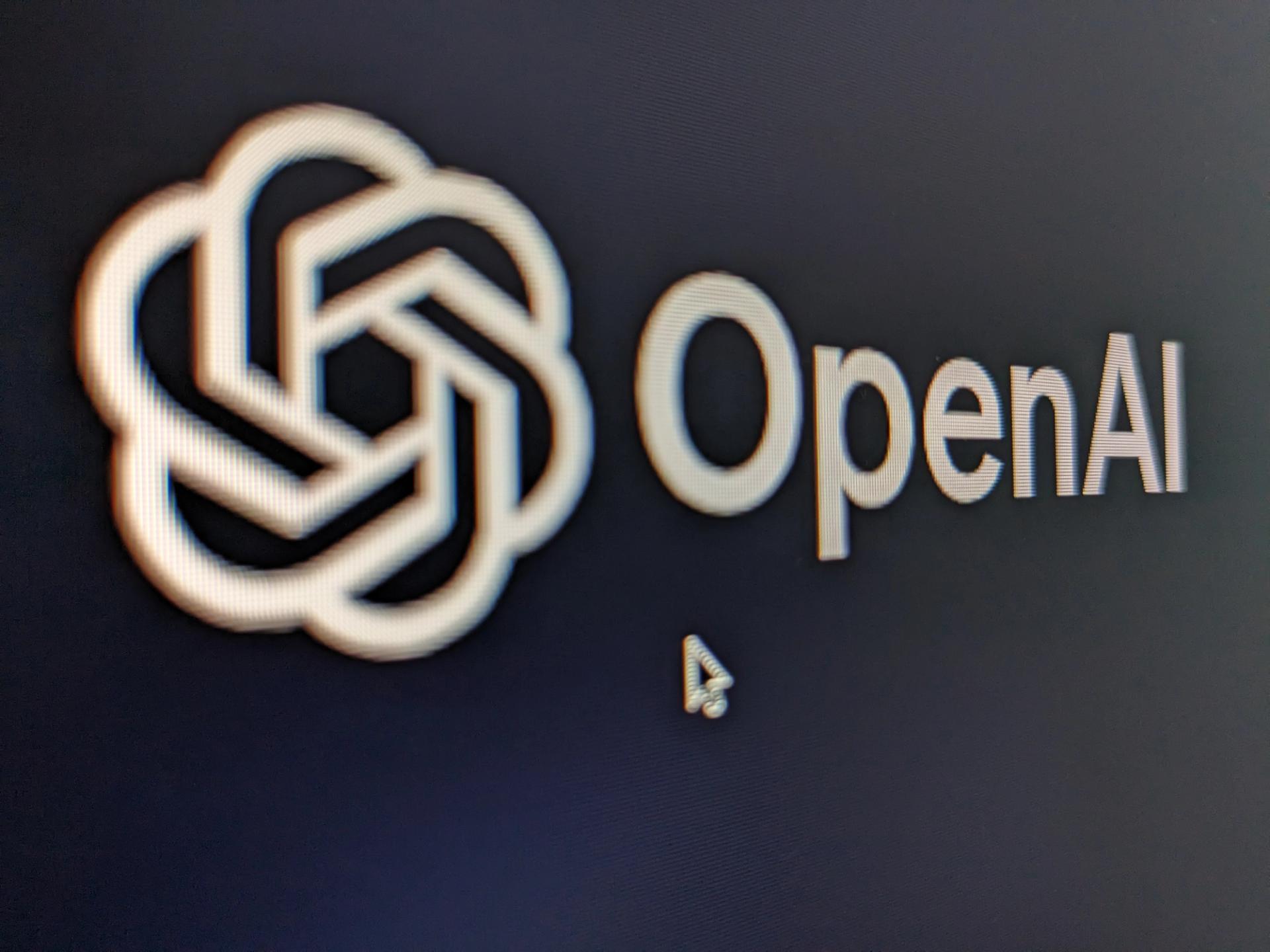 Open AI logo on a computer screen