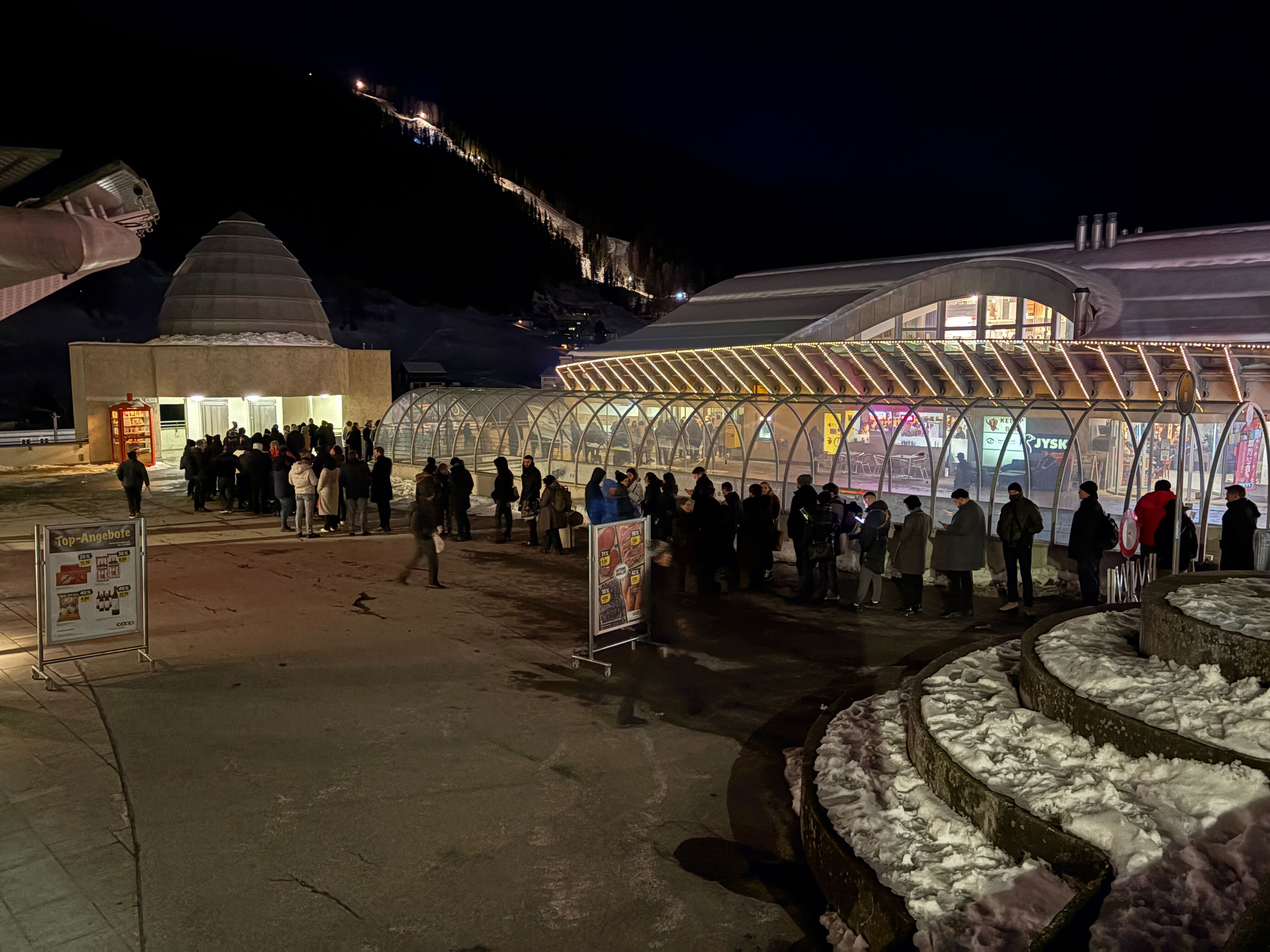 The line to fix badges in Davos.