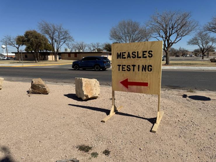 A sign reading “measles testing” is seen as an outbreak in Gaines County, Texas