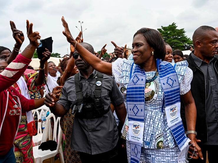 Simone Gbagbo, former First Lady of Côte d’Ivoire and president of the Mouvement des Generations Capable, greets her supporters at a rally in Abidjan on July 5, 2025.