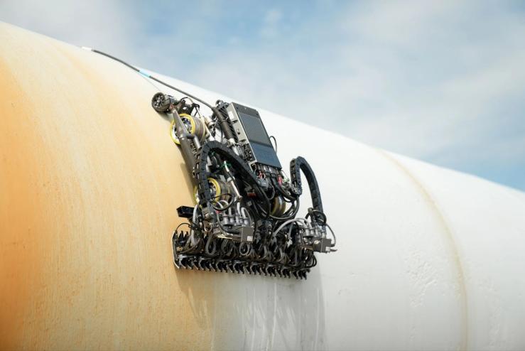 Gecko Robotics device inspecting a gas pipeline.