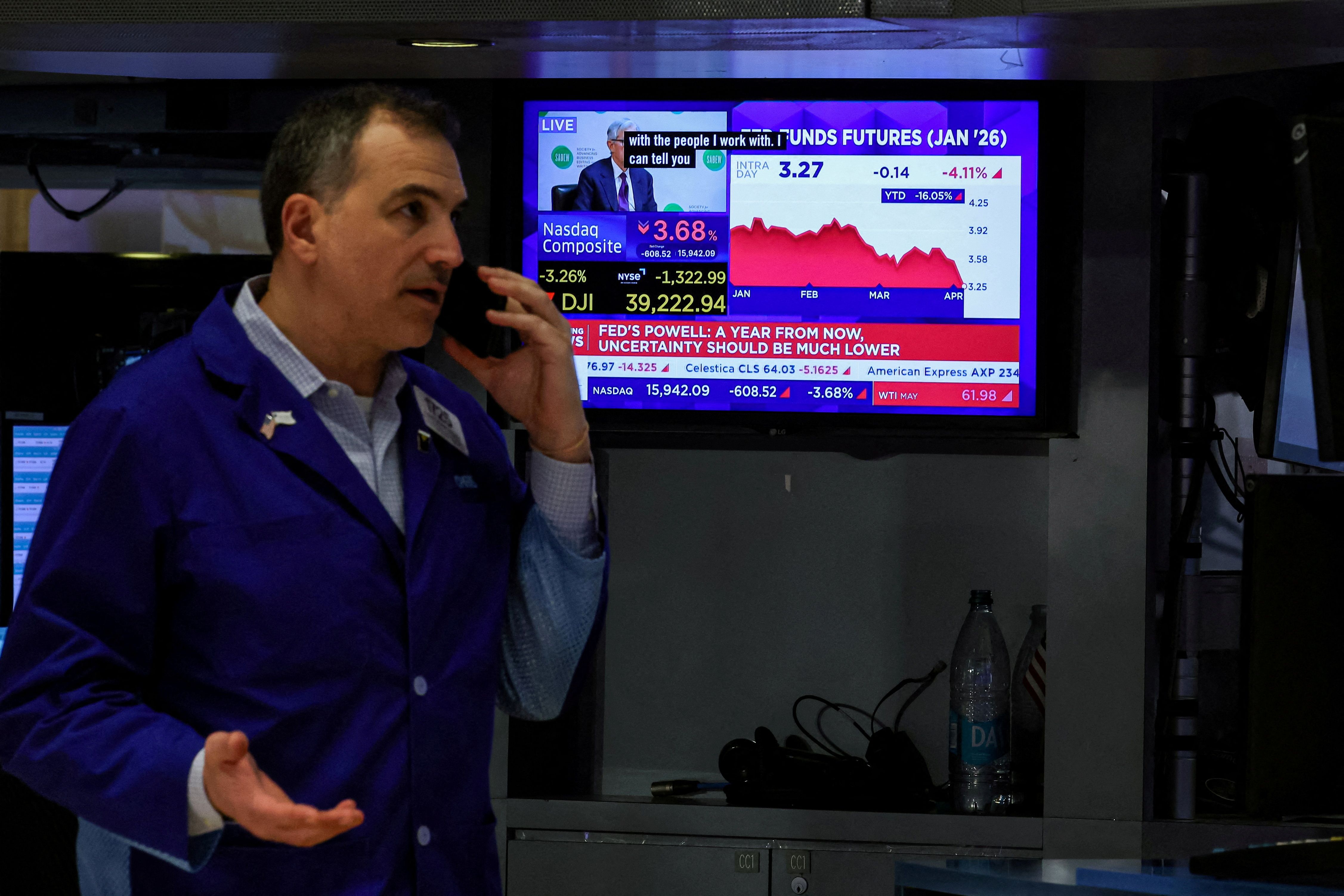 A trader works on the floor at the New York Stock Exchange 