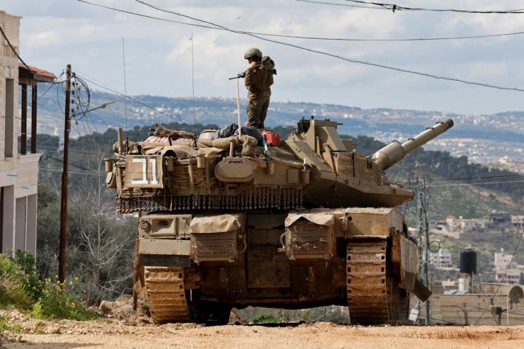 An Israeli soldier takes part in an operation near Jenin Camp, in the Israeli-occupied West Bank, February 24, 2025.