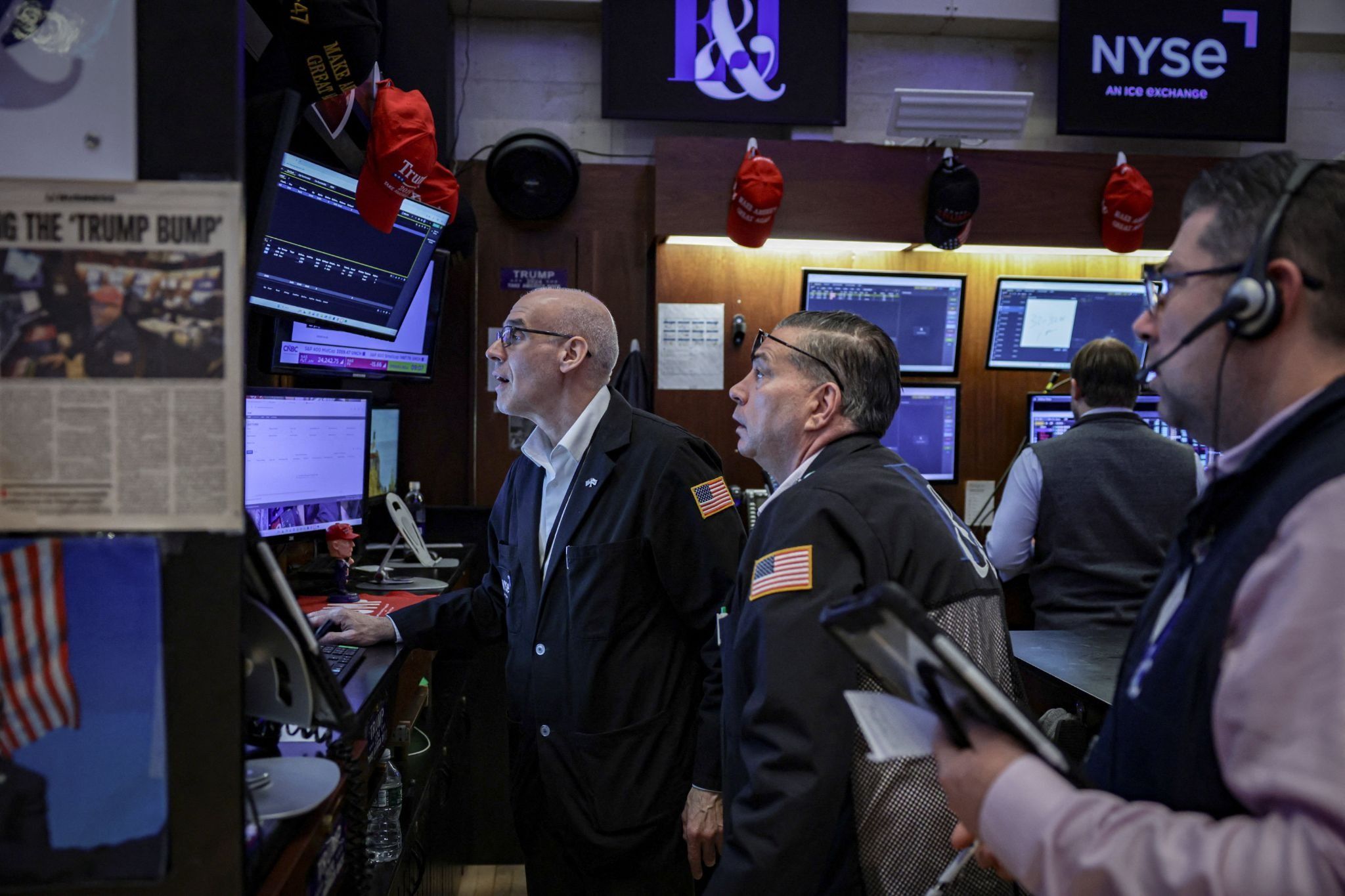 	Traders work on the floor at the New York Stock Exchange (NYSE) in New York City