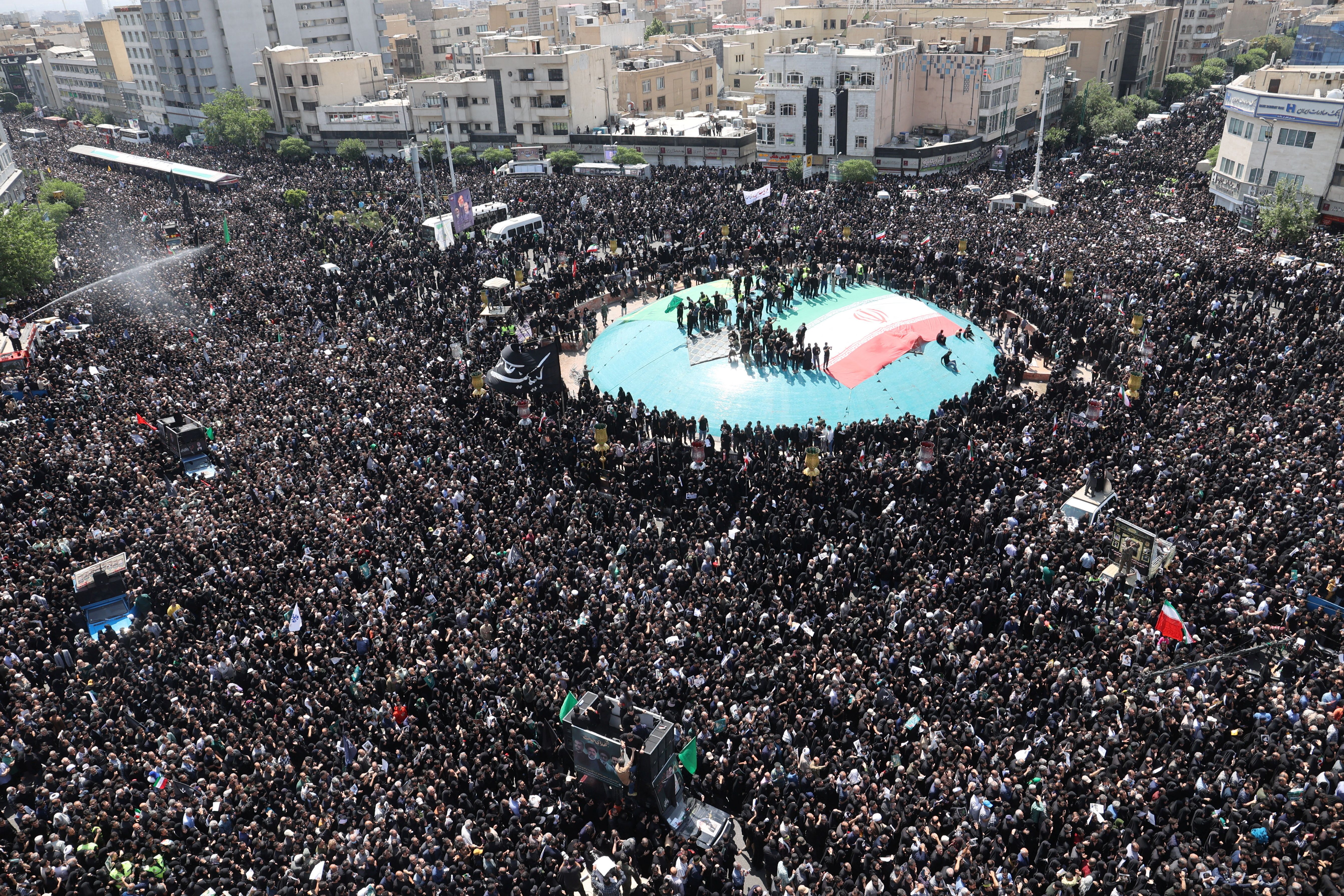 Mourners attend a funeral for victims of the helicopter crash that killed Iran’s President Ebrahim Raisi, Foreign Minister Hossein Amirabdollahian and others, in Tehran, Iran, May 22, 2024. Majid Asgaripour/WANA (West Asia News Agency) via REUTERS