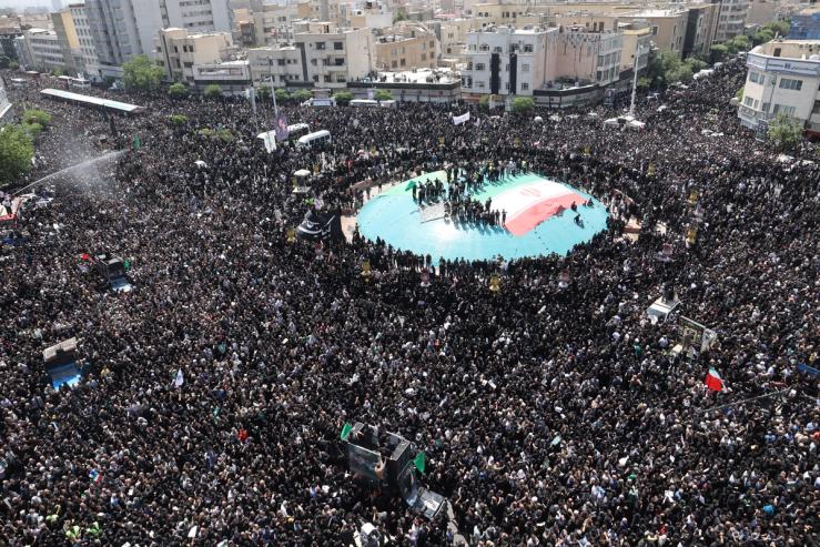 Mourners attend a funeral for victims of the helicopter crash that killed Iran’s President Ebrahim Raisi, Foreign Minister Hossein Amirabdollahian and others, in Tehran, Iran, May 22, 2024. Majid Asgaripour/WANA (West Asia News Agency) via REUTERS