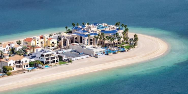 Dubai Luxury villas real estate on The Palm Jumeirah artificial island with beach panorama.