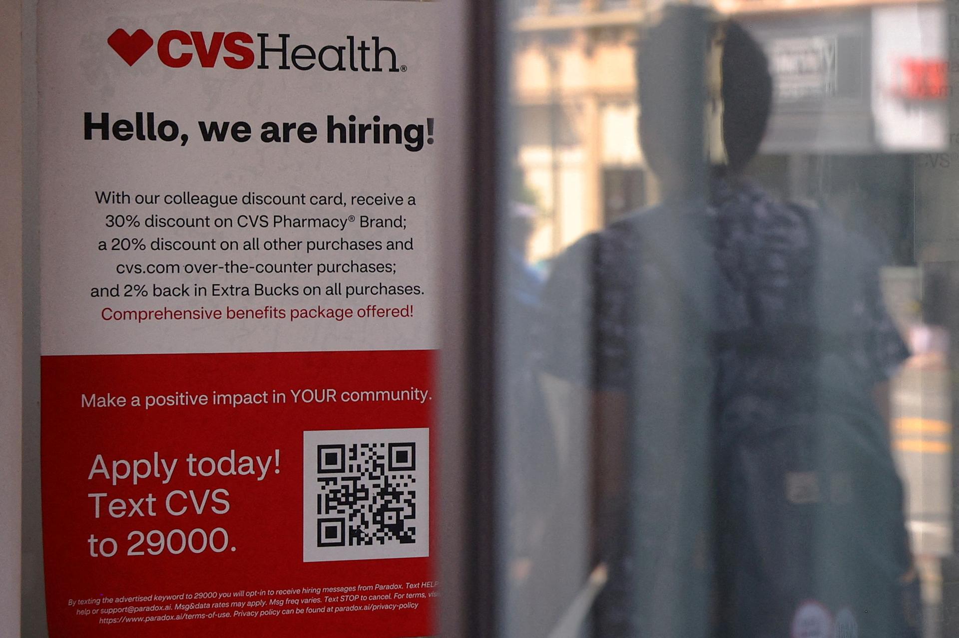 A CVS store advertises it is hiring in Cambridge, Massachusetts.