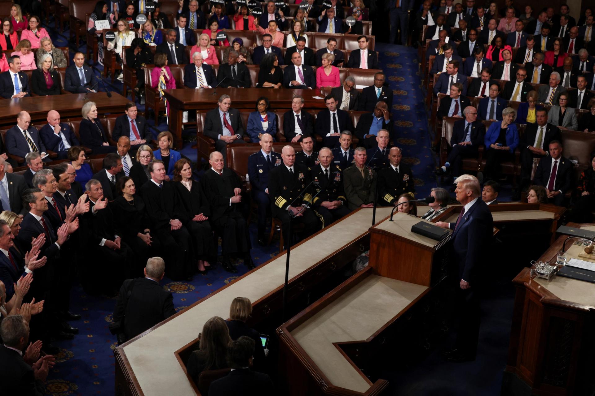 U.S. President Donald Trump looks on during a joint session of Congress.