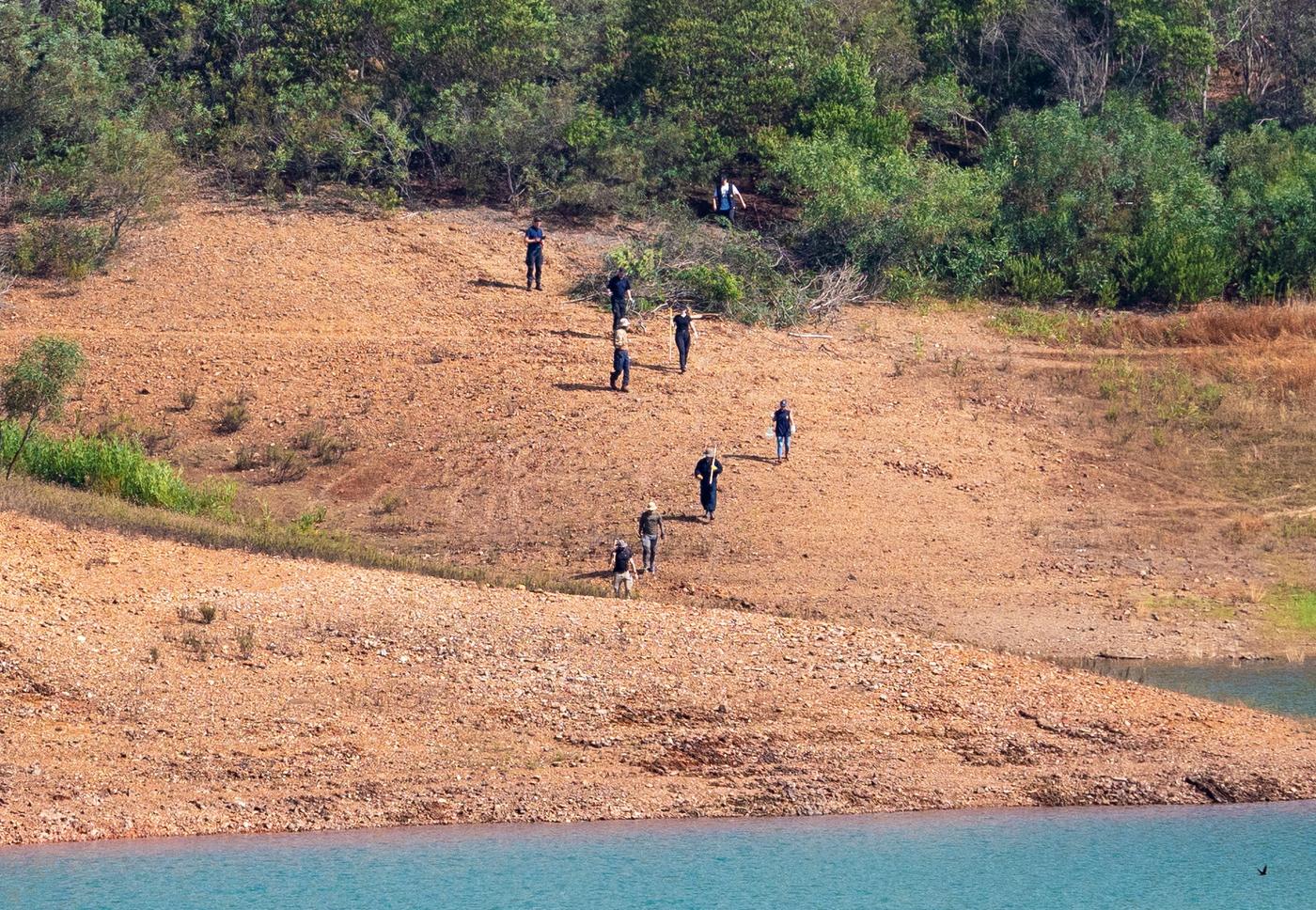 Portuguese and German police search a reservoir near the area where British girl Madeleine McCann went missing in the Portuguese Algarve in May 2007, in Silves, Portugal, May 24, 2023. 
