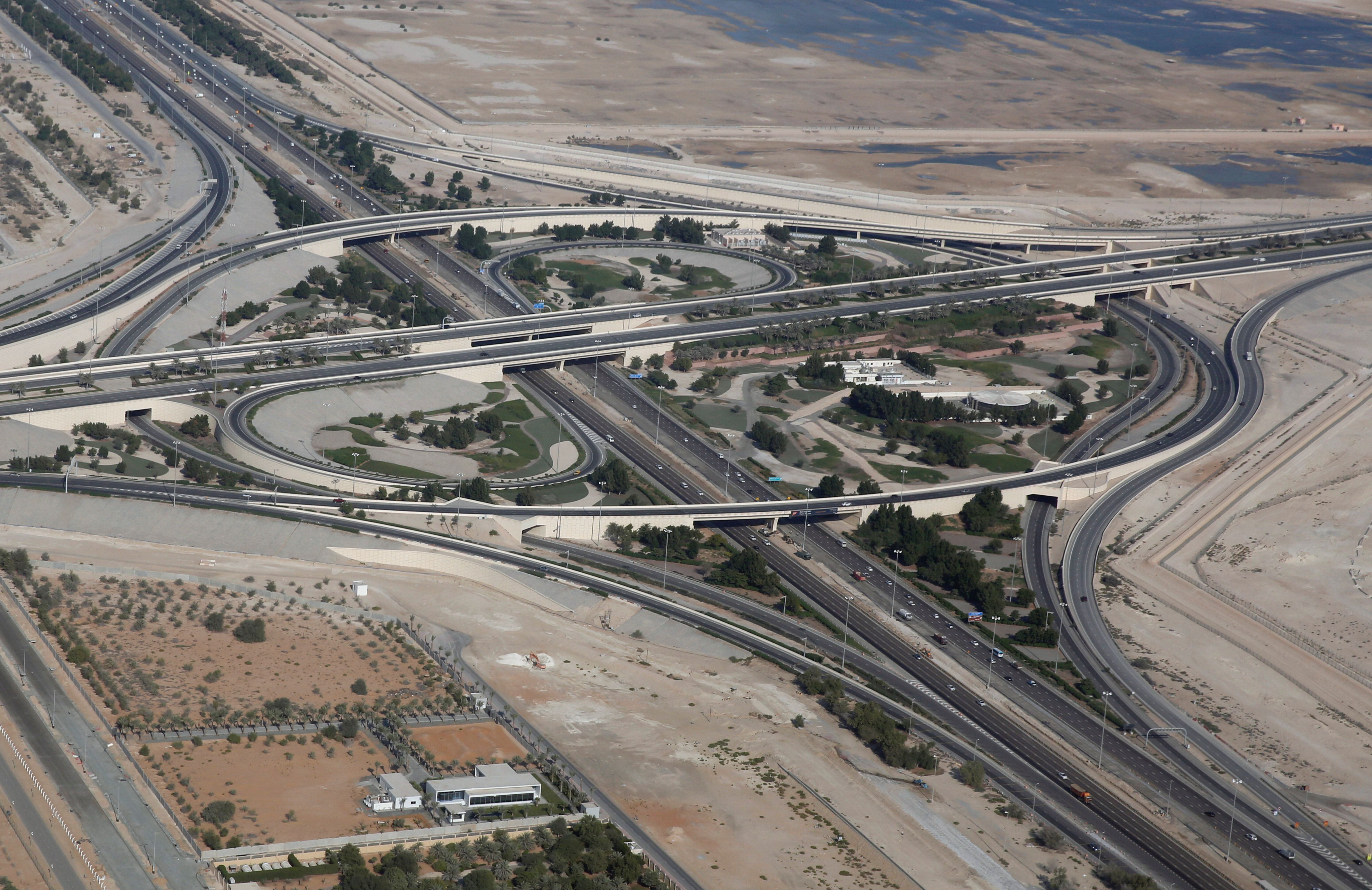 An aerial view of bridges and roads in Abu Dhabi.