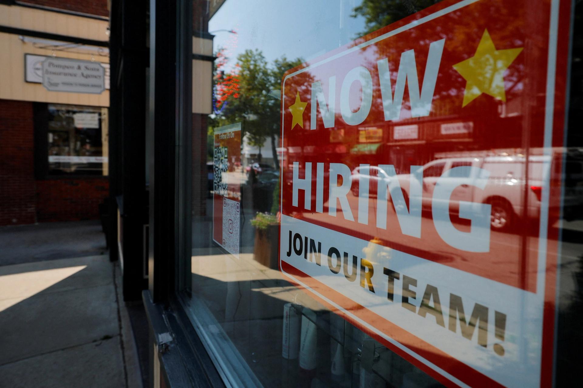 A ‘Now Hiring’ sign 