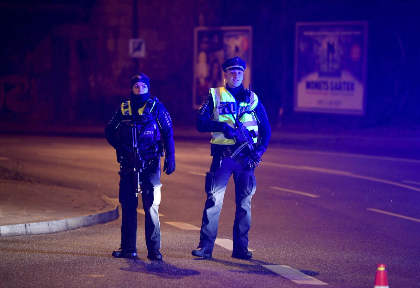 Police secures the area after at least six people are dead and several more injured in a shooting in the northern German city of Hamburg, Germany, March 9, 2023.