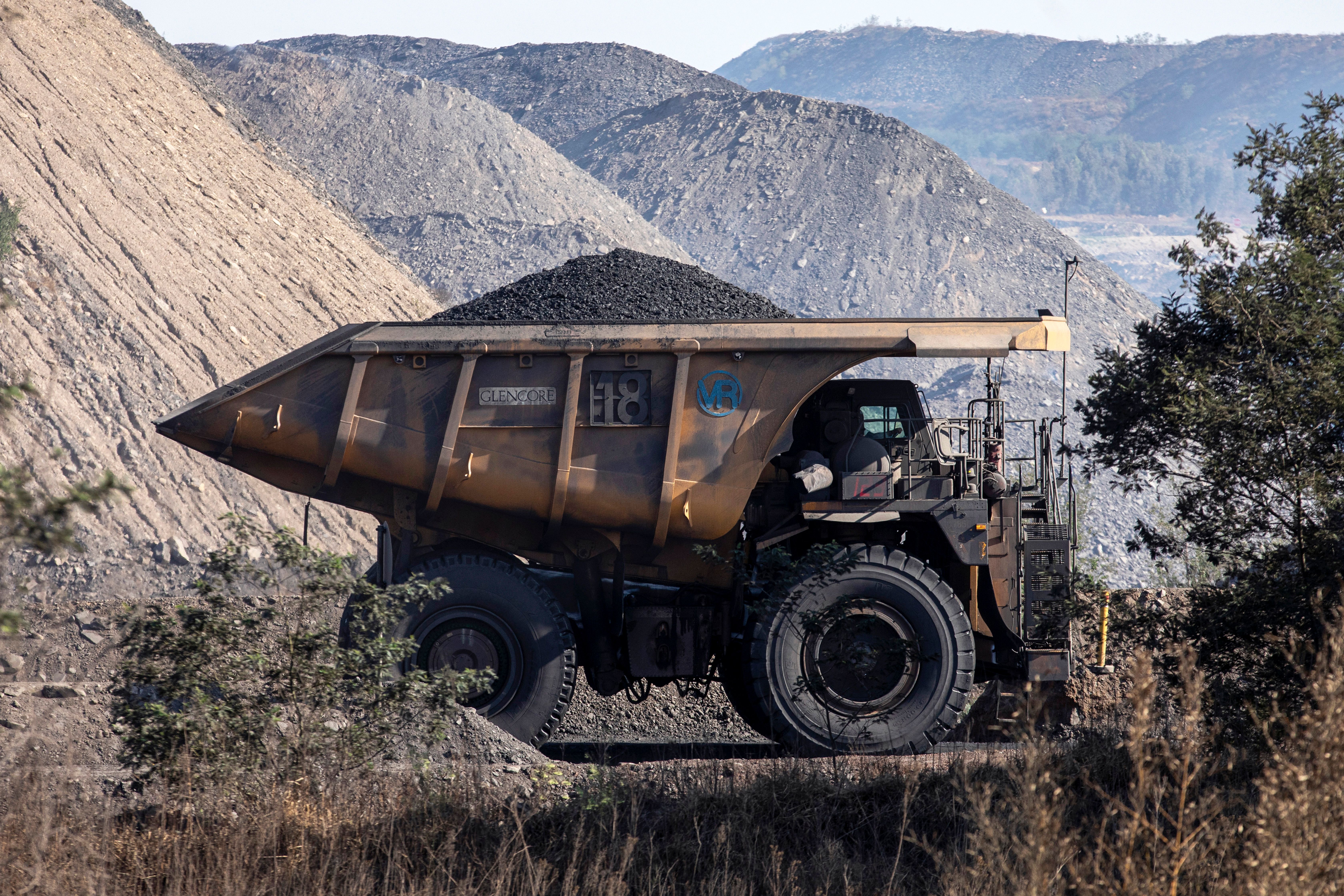 A mining truck carries a full load of coal at Glencore Plc operated Tweefontein coal mine.