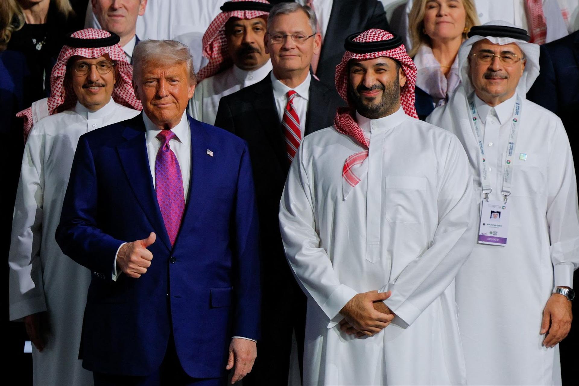 President Donald Trump and Saudi Crown Prince Mohammed Bin Salman pose for a group photo during the Saudi-U.S. Investment Forum, in Riyadh, Saudi Arabia