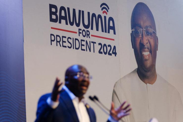 Vice President Mahamudu Bawumia, presidential candidate of Ghana’s ruling New Patriotic Party, delivers a speech next to a poster with his picture during his campaign launch event ahead of the 2024 presidential election in Accra, Ghana, on Feb. 7, 2024.