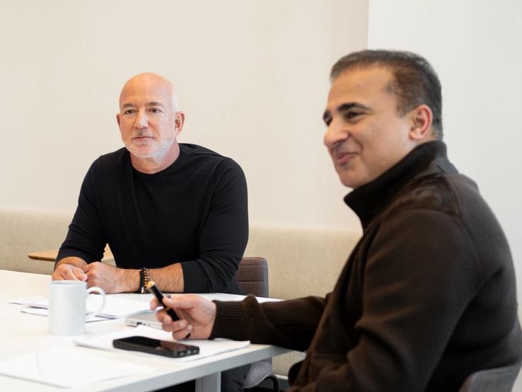 Jeff Bezos and Vik Bajaj.