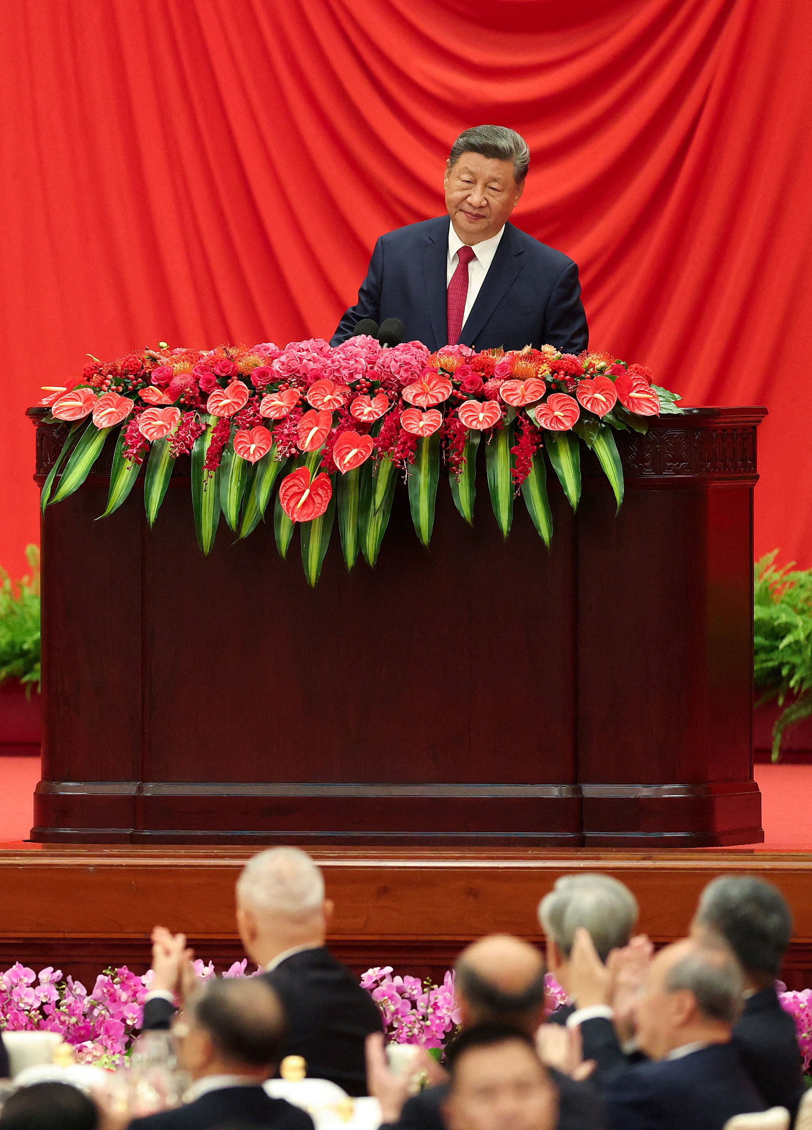 China’s President Xi Jinping delivers a speech during the National Day reception