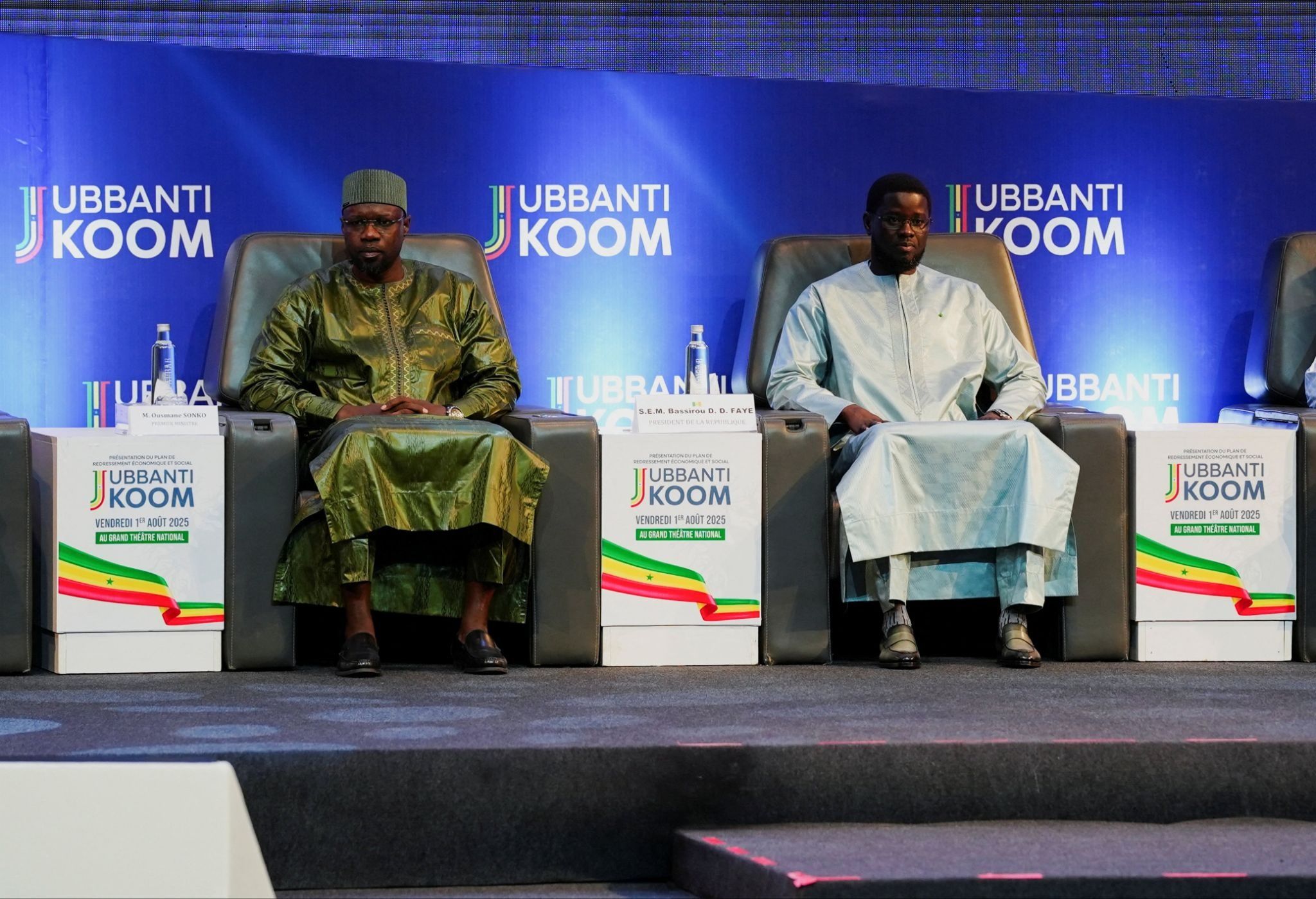 Senegal’s Prime Minister Ousmane Sonko (L) sits with the country’s president, Bassirou Diomaye Faye.