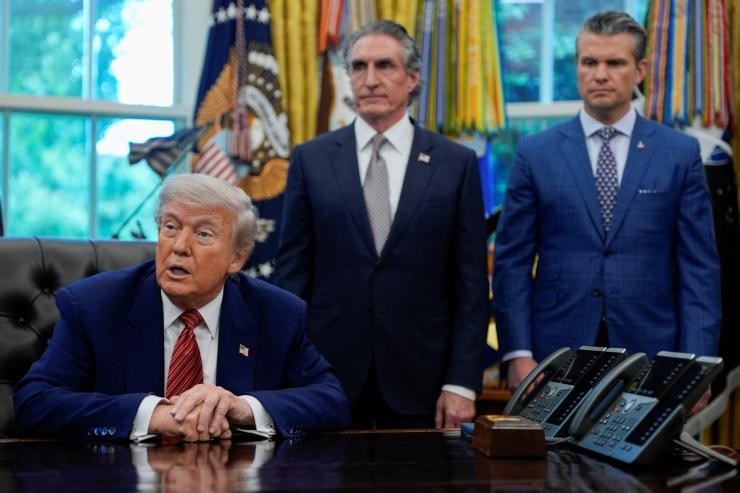 US President Donald Trump speaks in the Oval Office.