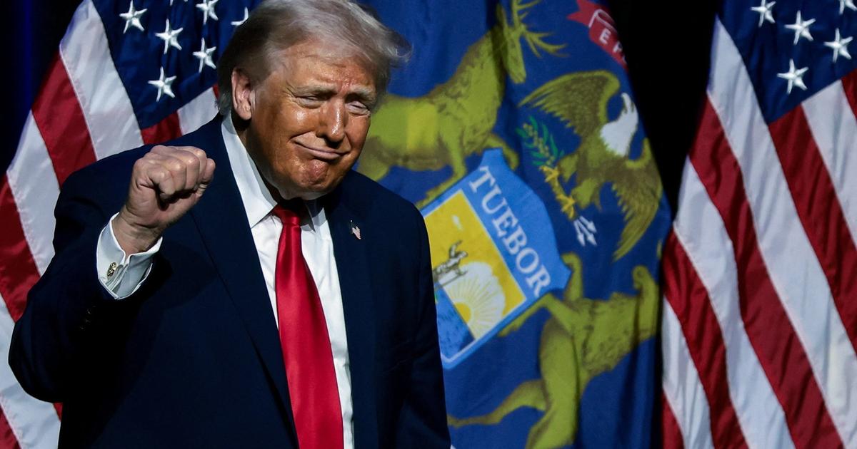 Trump stops in Michigan swing district