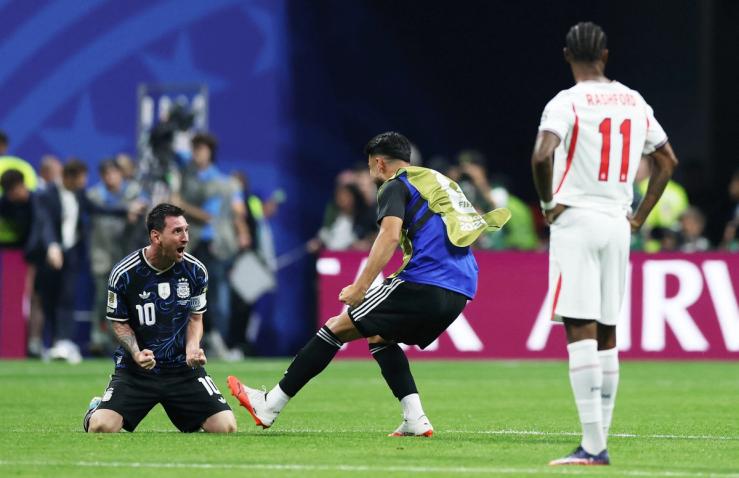 Argentina’s Lionel Messi celebrates after the match