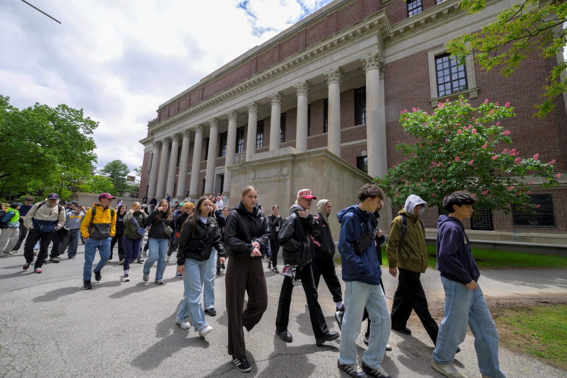 Students from Quebec, Canada tour the campus of Harvard University in Cambridge, Massachusetts.