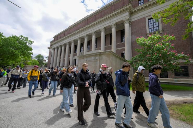 Students from Quebec, Canada tour the campus of Harvard University in Cambridge, Massachusetts.