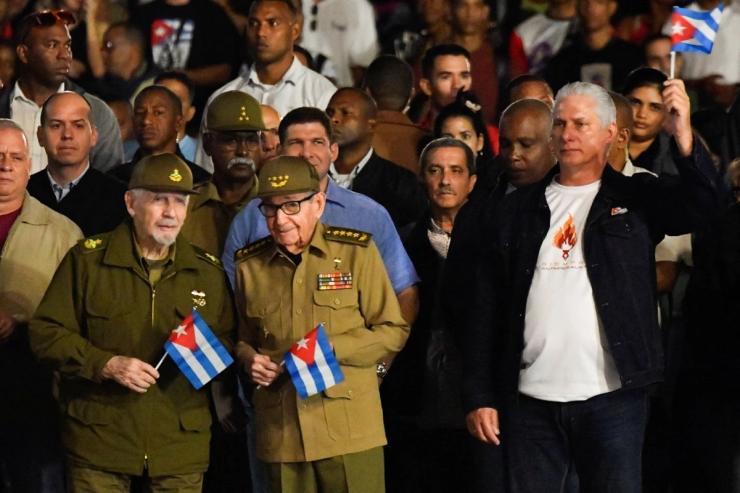 Former Cuban leader Raúl Castro, center, and Cuban President Miguel Díaz-Canel, right.