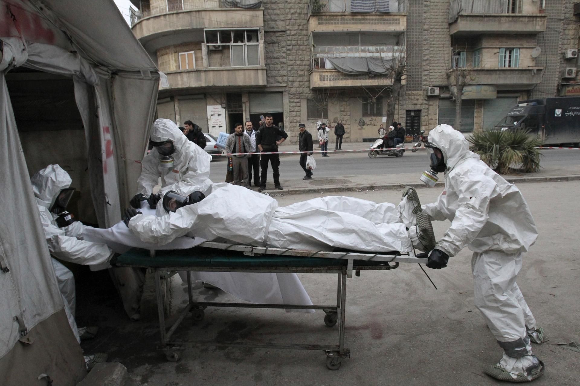 Free Syrian Army medical group trains people on how to cope with chemical weapon attacks in Aleppo December 25, 2013.