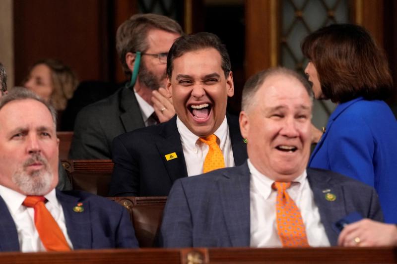 Rep. George Santos, R-N.Y., laughs before President Joe Biden delivers the State of the Union address to a joint session of Congress at the U.S. Capitol, Tuesday, Feb. 7, 2023, in Washington.