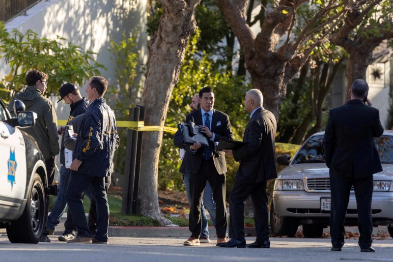 Members of law enforcement work outside the home of U.S. House Speaker Nancy Pelosi where her husband Paul Pelosi was violently assaulted after a break-in at their house, according to a statement from her office, in San Francisco, California, U.S., October 28, 2022. 