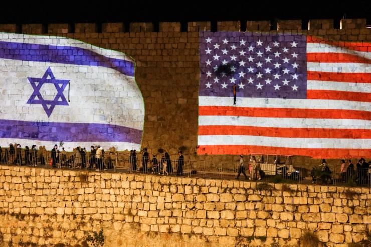 United States and Israel flags are projected on the walls of the Old city of Jerusalem