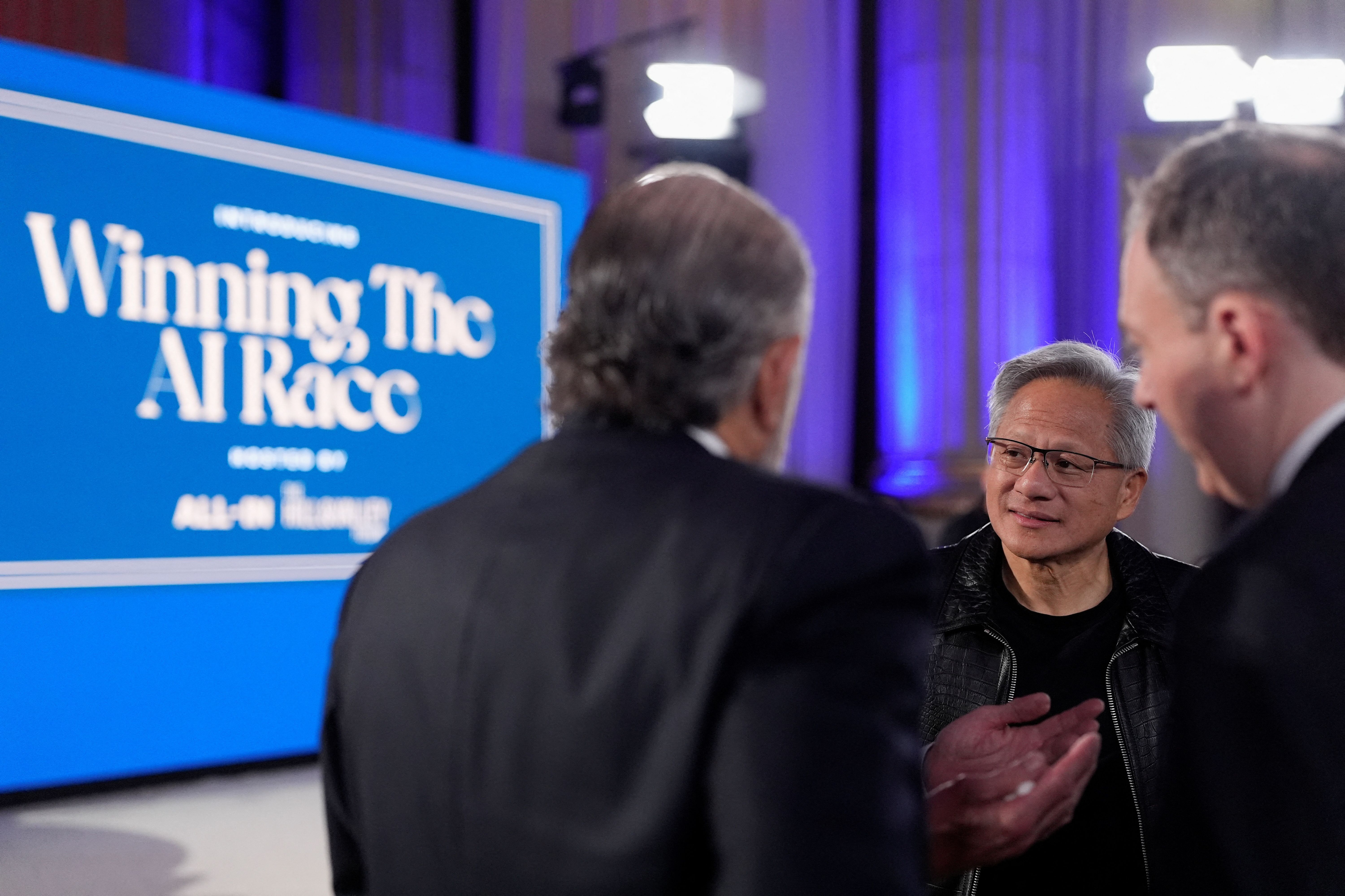 Nvidia CEO Jensen Huang, Commerce Secretary Howard Lutnick, and Environment Protection Agency (EPA) administrator Lee Zeldin attend the “Winning the AI Race” Summit in Washington.