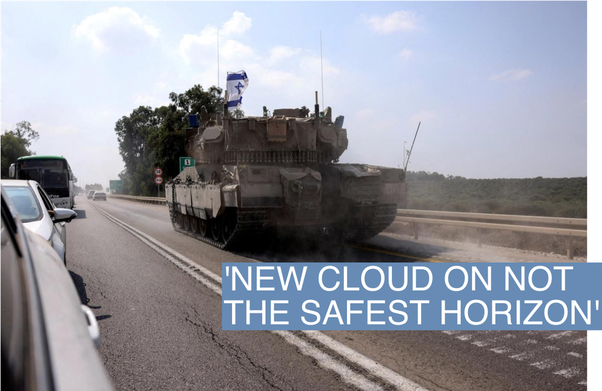An Israeli tank drives on a road following a mass infiltration by Hamas gunmen from the Gaza Strip, near Sderot in southern Israel October 8, 2023. REUTERS/Ronen Zvulun