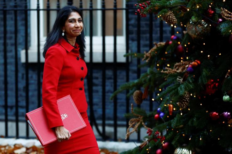 British Home Secretary Suella Braverman walks outside Downing Street in London, Britain December 6, 2022.