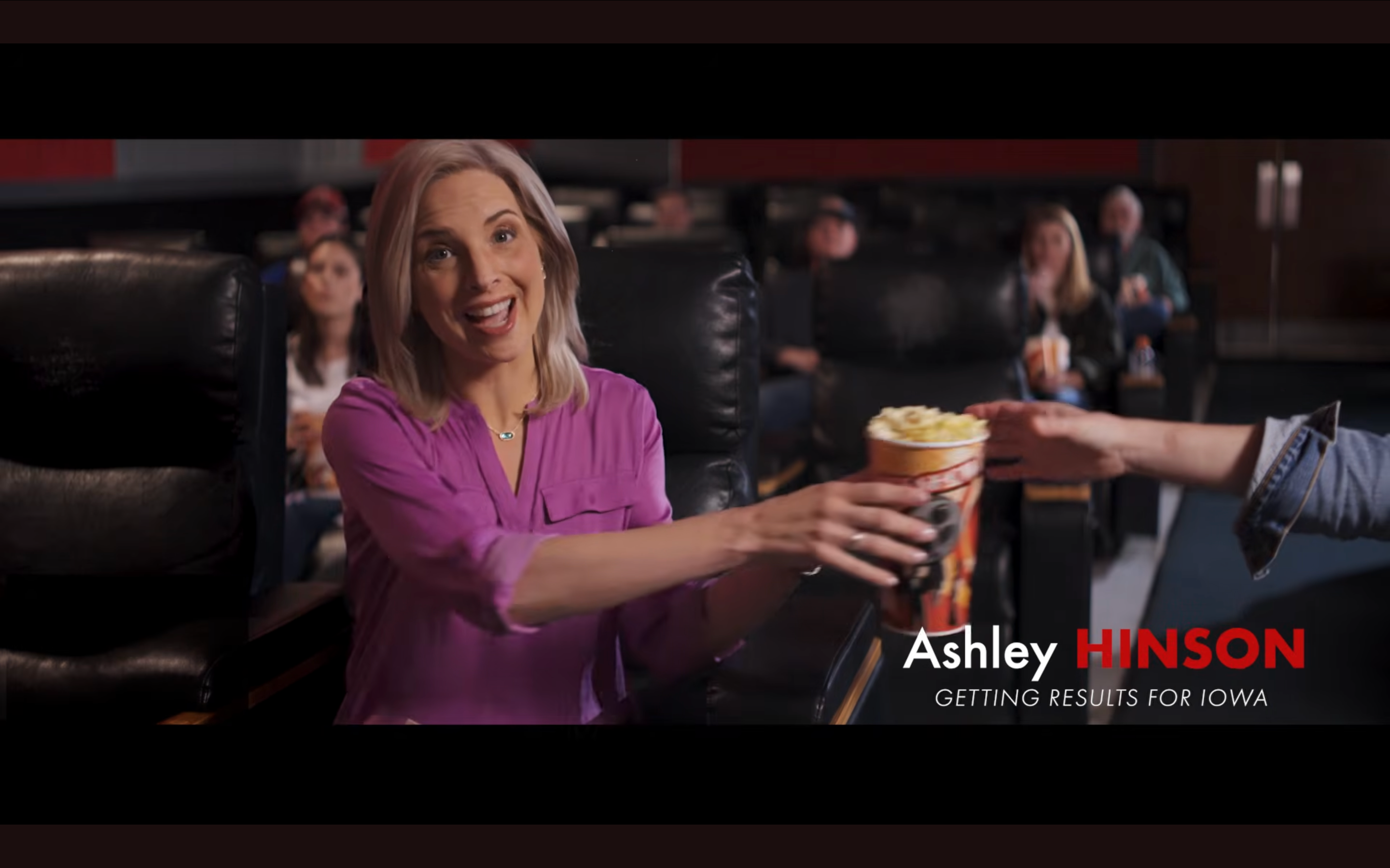 “Aisle” screenshot from Ashley Hinson ad 