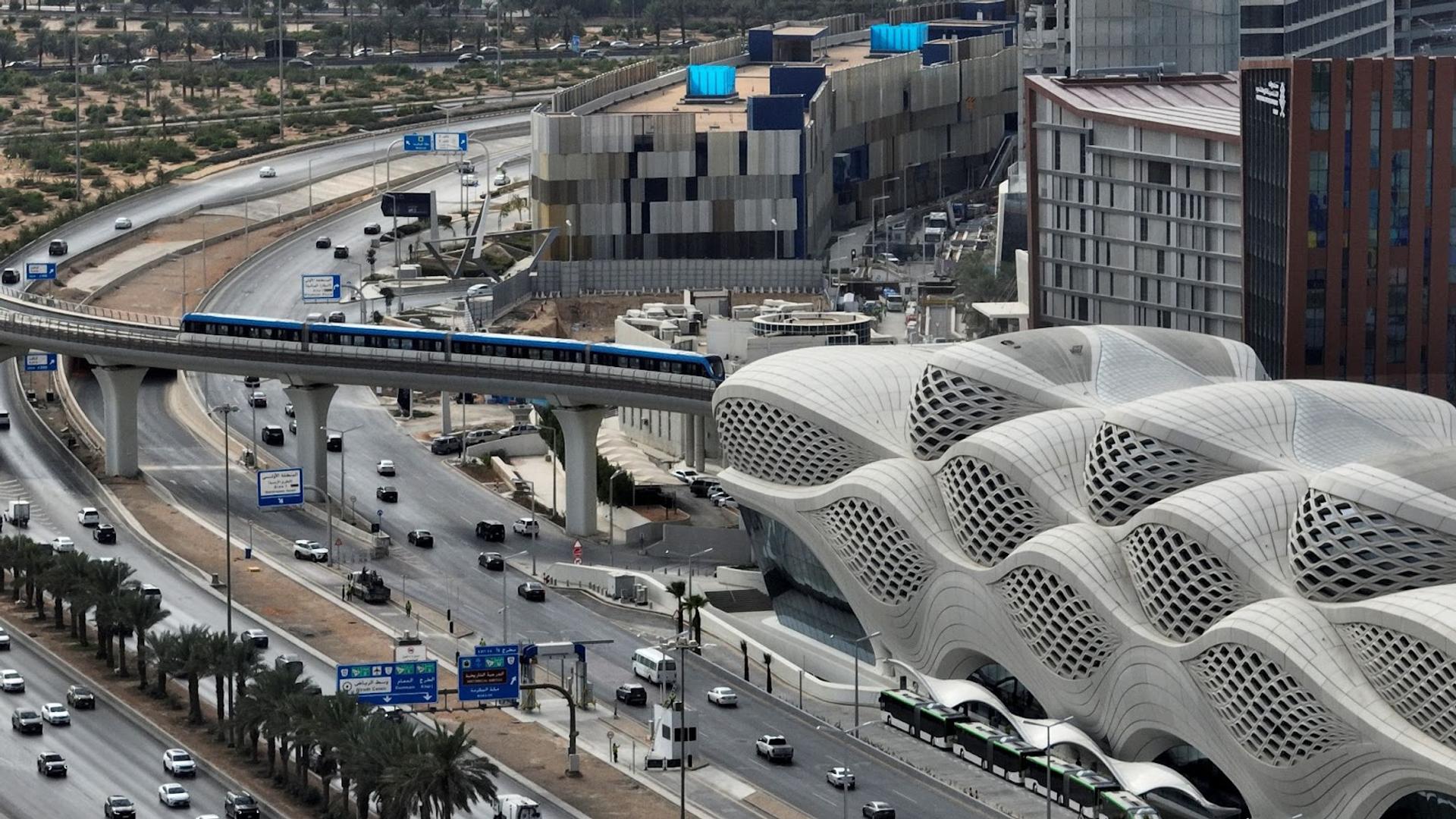 A train leaves the King Abdullah Financial District Metro Station in Riyadh